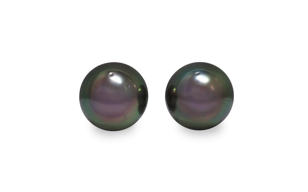 A round shape Tahitian pearl pair is displayed on a white background.