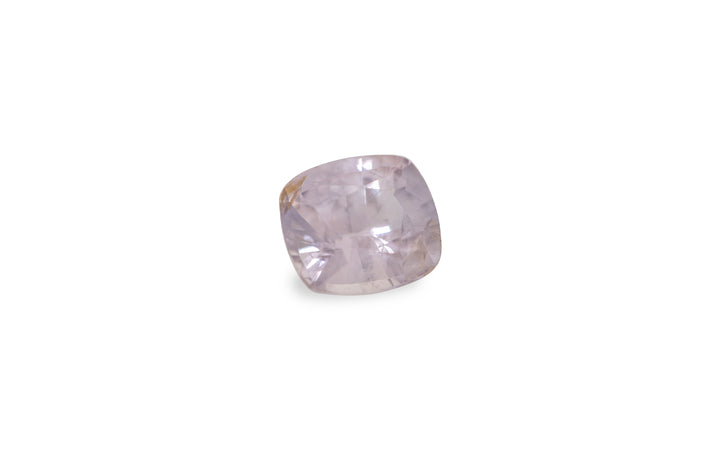 A cushion cut pink Burmese sapphire gemstone is displayed on a white background.