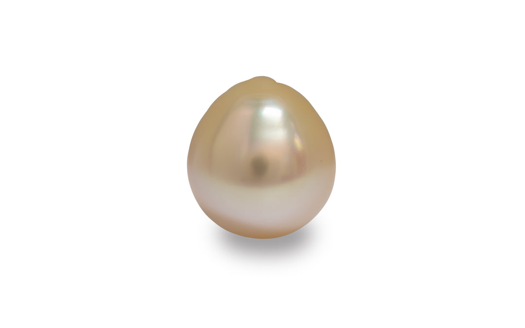 A drop shaped golden South Sea pearl is displayed on a white background.