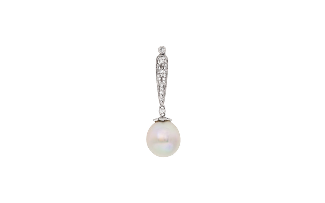 A drop shape pink white South Sea pearl diamond art deco pendant in 18k white gold is displayed on a white background.
