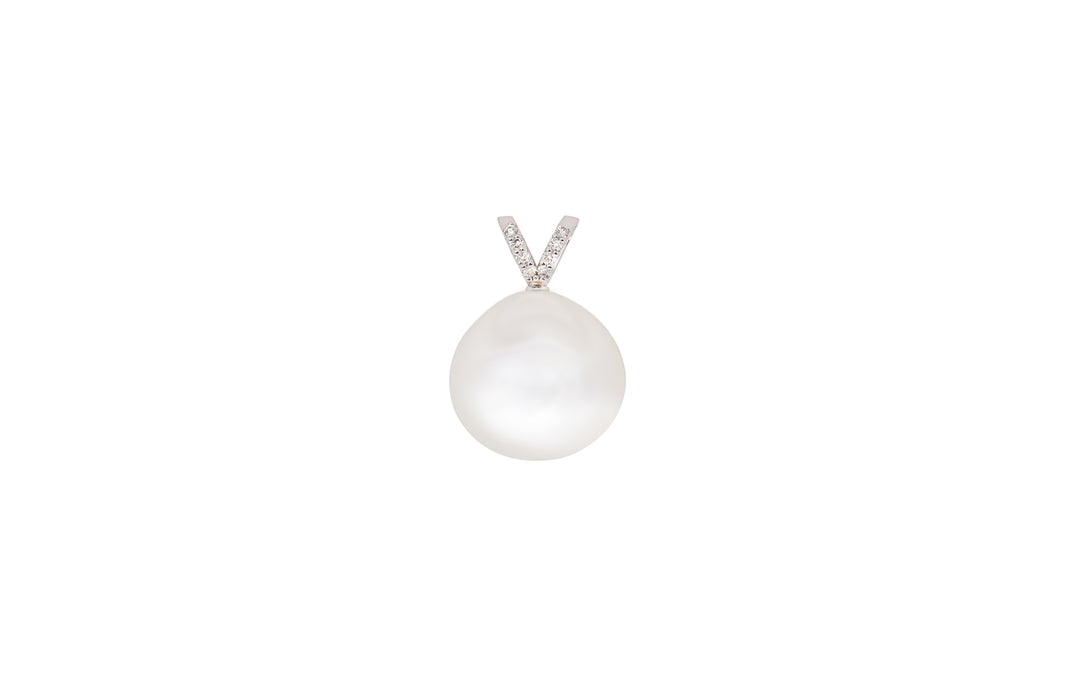 A drop shape white South Sea pearl diamond pendant in 18k white gold is displayed on a white background. 