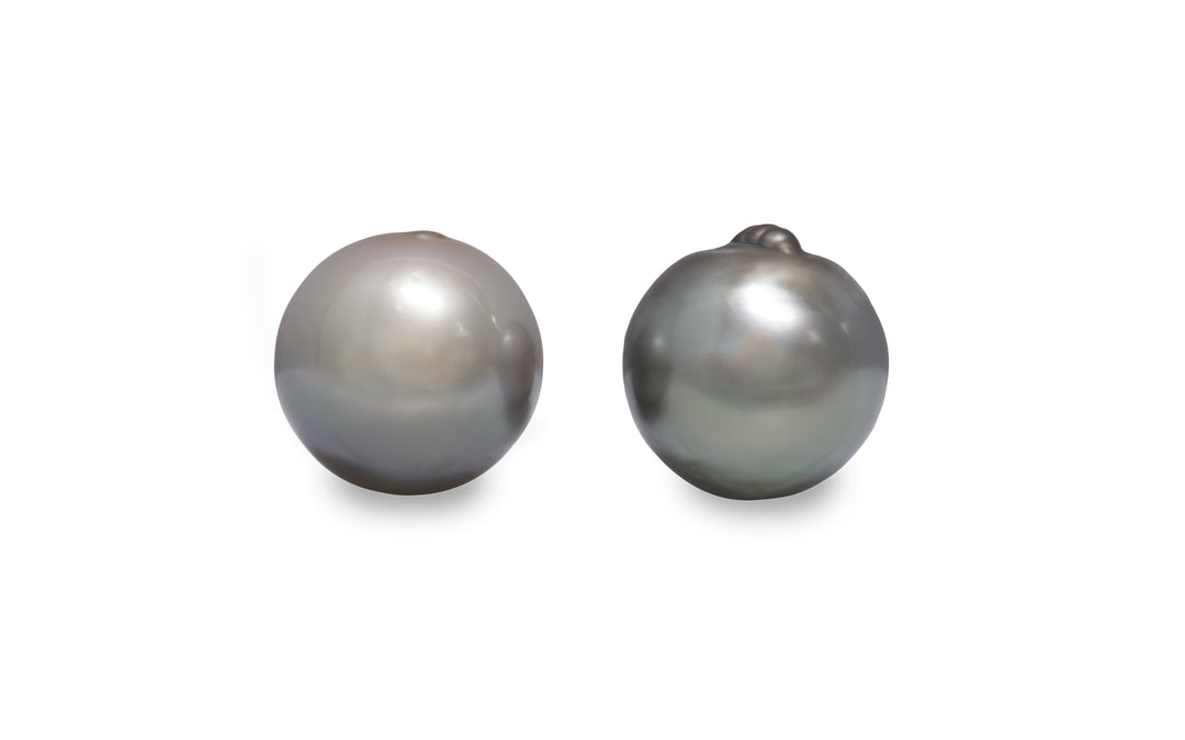 A high button shape Tahitian pearl pair gemstone is displayed on a white background.