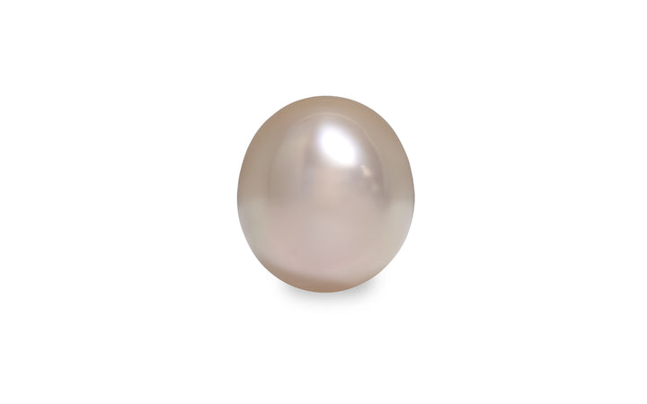 An oval shape pink gold South Sea pearl is displayed on a white background.