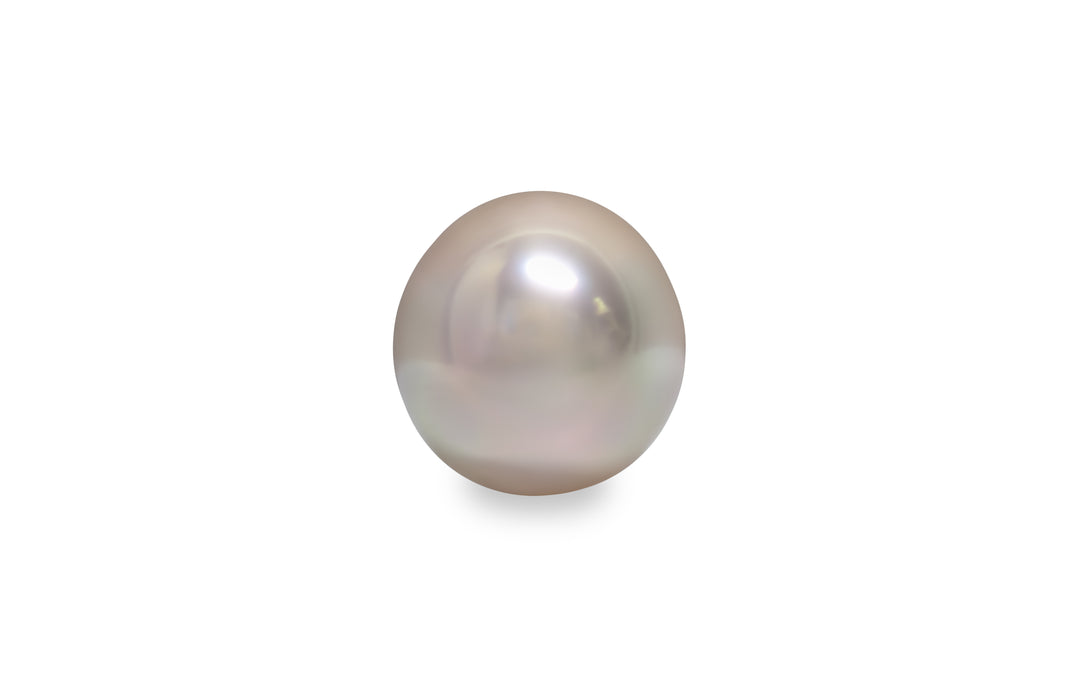 An oval shape pink gold South Sea pearl is displayed on a white background.