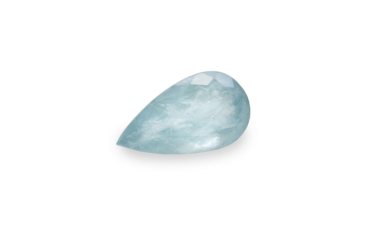 A pear cut aquamarine gemstone is displayed on a white background.