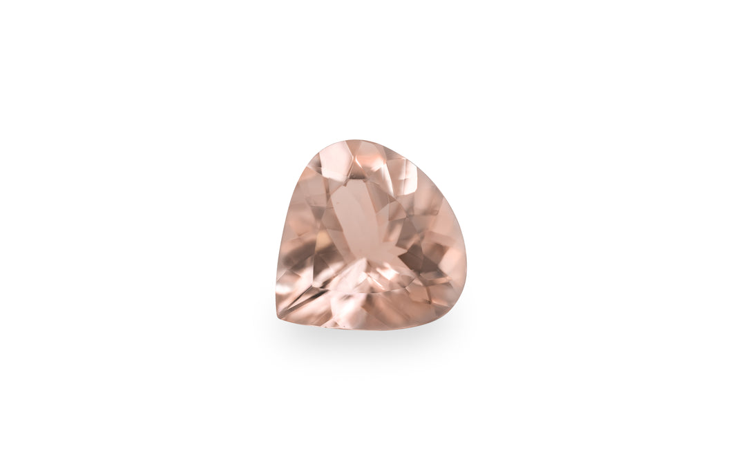 A pear cut peach morganite gemstone is displayed on a white background.