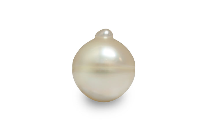 A semi baroque shape light gold Golden South Sea pearl is displayed on a white background.