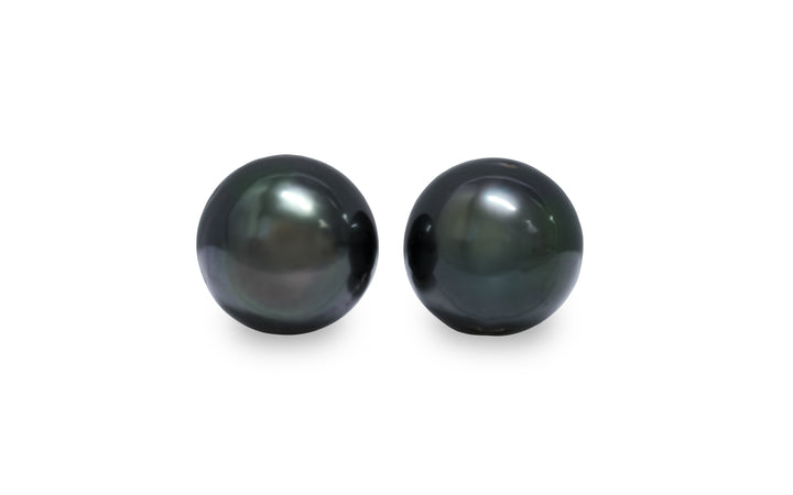 A semi round shape Tahitian pearl pair is displayed on a white background.