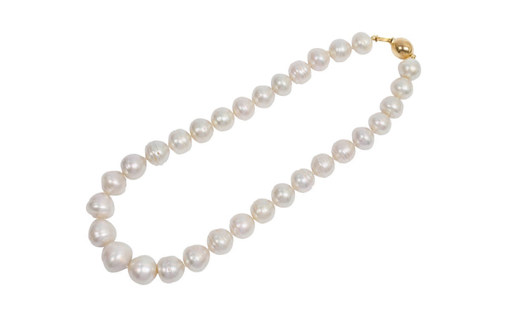 A 44.5cm white south sea pearl strand necklace is displayed against a white background.