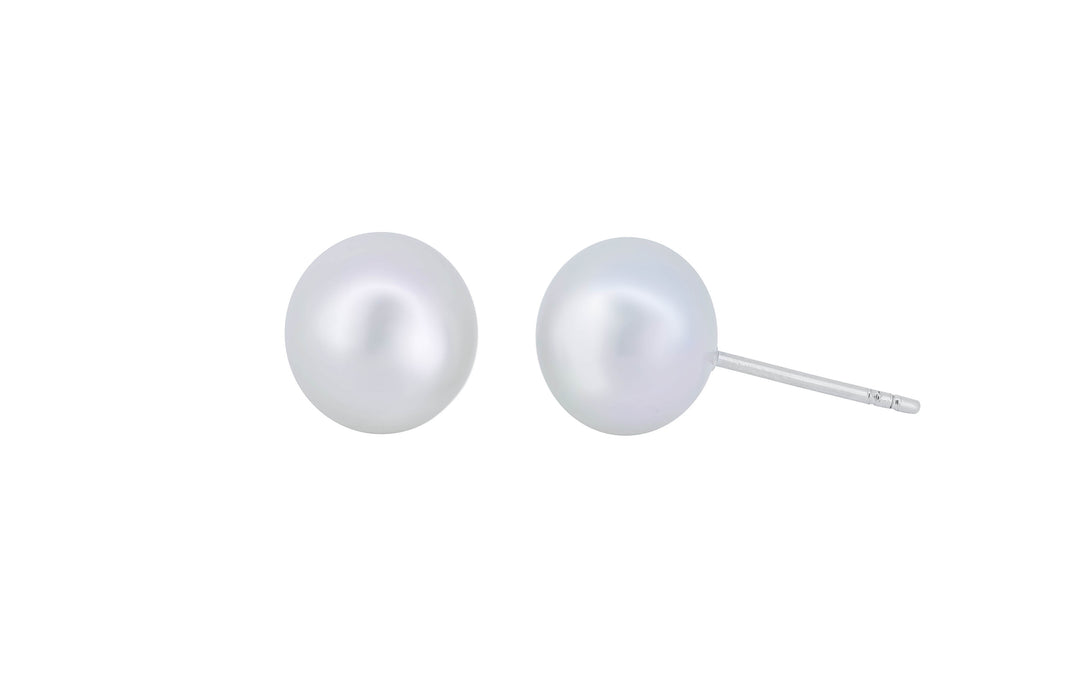 A pair of white south sea pearl 18k white gold stud earrings is displayed on a white background.
