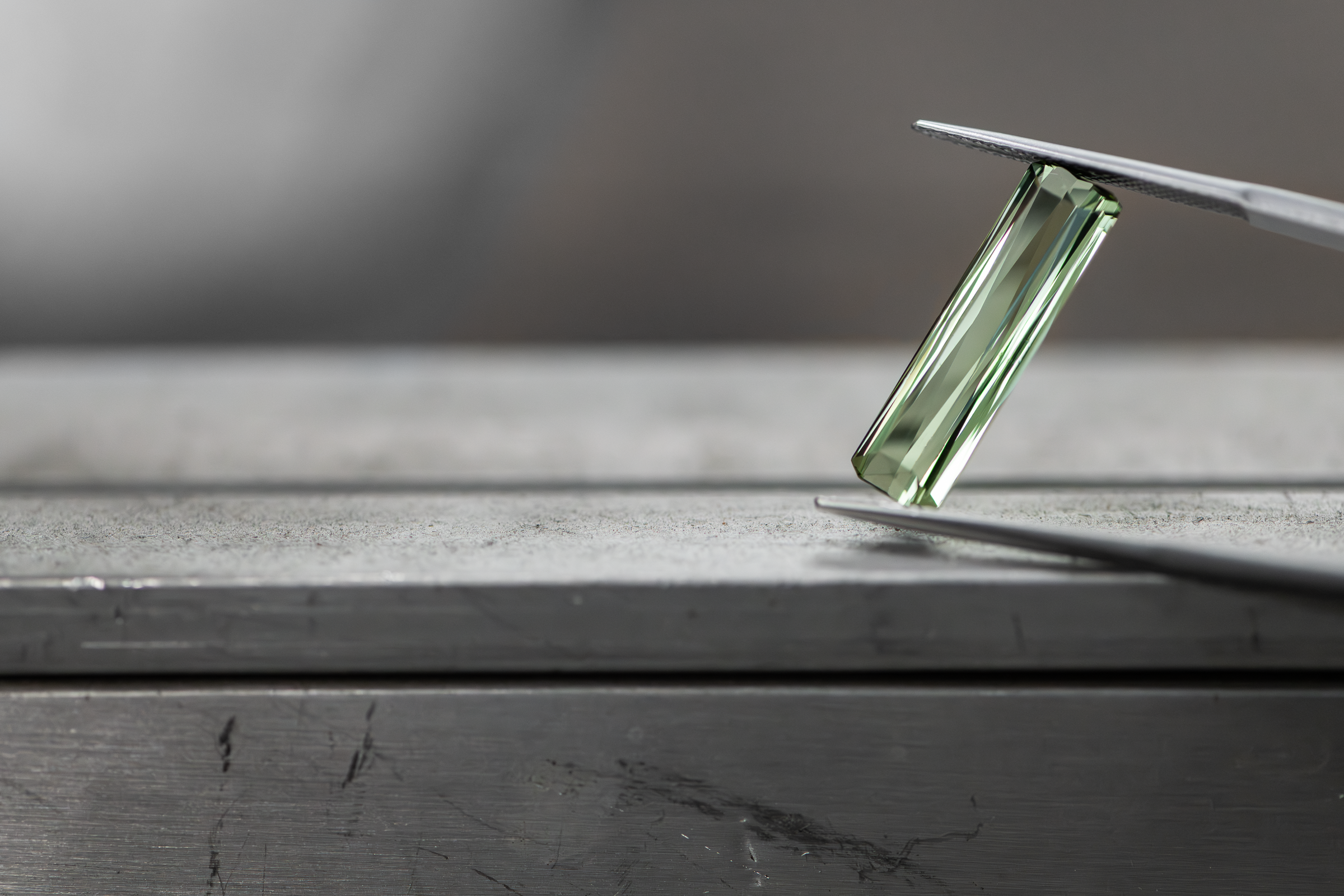 Green tourmaline in a radiant scissor-cut.