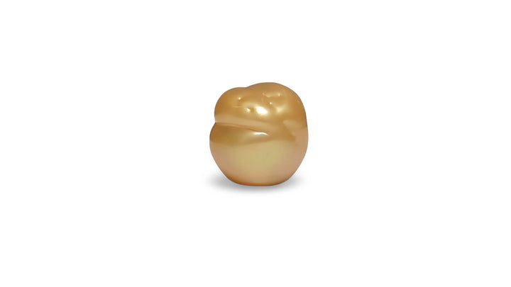 A baroque shape golden South Sea pearl is displayed on a white background.
