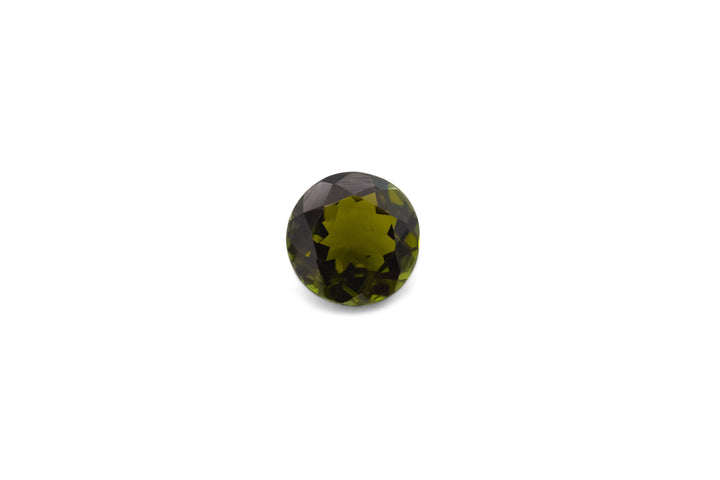 A round cut olive green tourmaline is displayed on a white background.