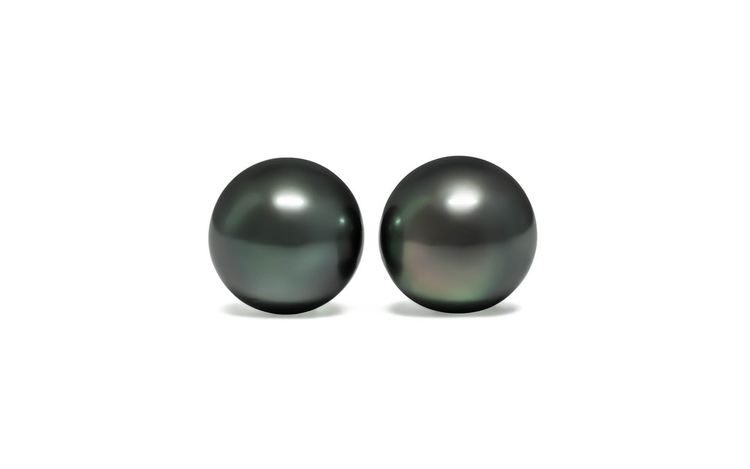 A round shape pair of green Tahitian pearls is displayed on a white background.