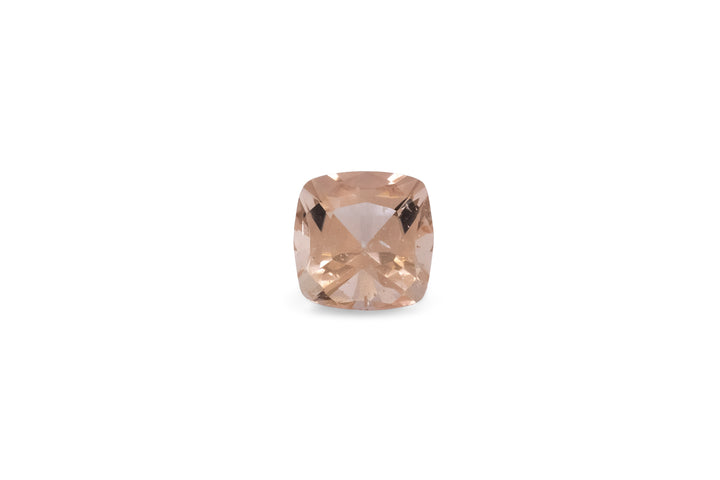 A square cushion cut pink morganite gemstone is displayed on a white background.